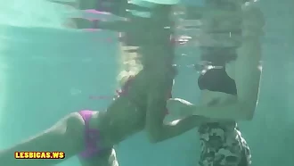 Girls kissing nice in the pool