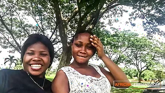 Horny black lesbians talking dirty in outdoor park before sex